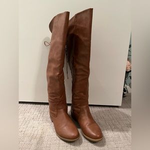 Over the knee riding boots